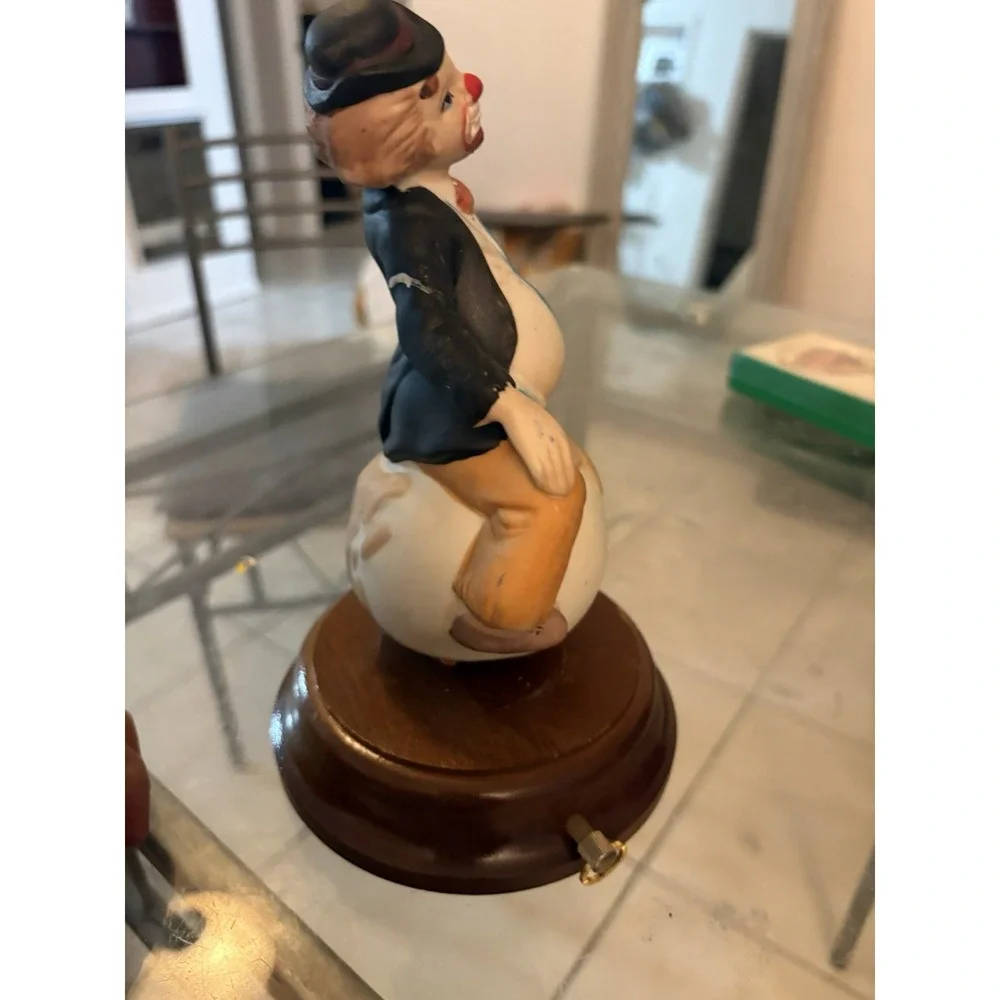 Vintage 1980 Price Products Porcelain Clown Sitting on World Globe Music Box